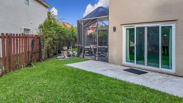 view of yard with a patio area and a lanai