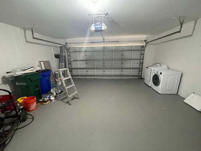 garage featuring a garage door opener and washer / clothes dryer