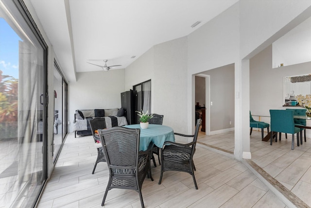 interior space featuring vaulted ceiling, light hardwood / wood-style flooring, and ceiling fan