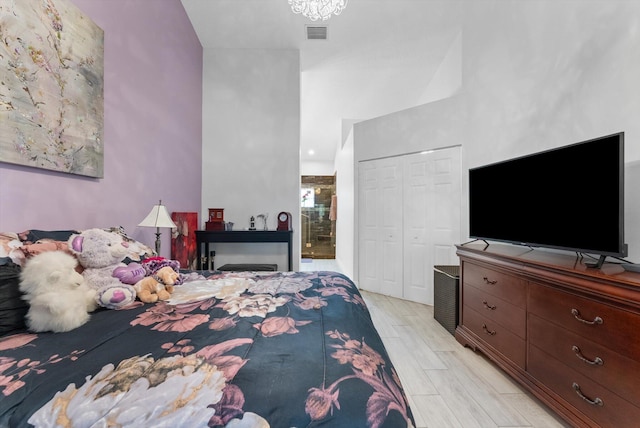 bedroom featuring a closet and light hardwood / wood-style floors