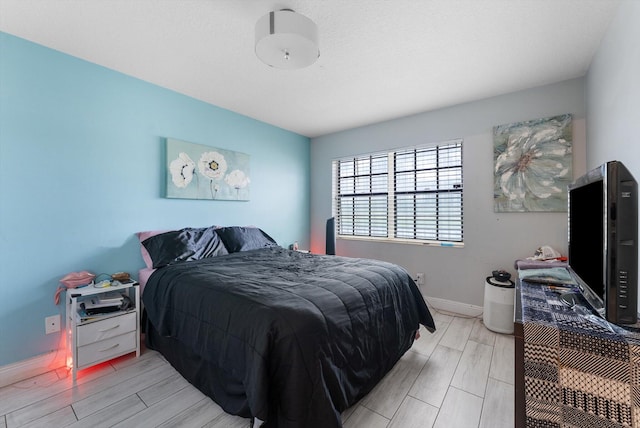 bedroom featuring light hardwood / wood-style floors