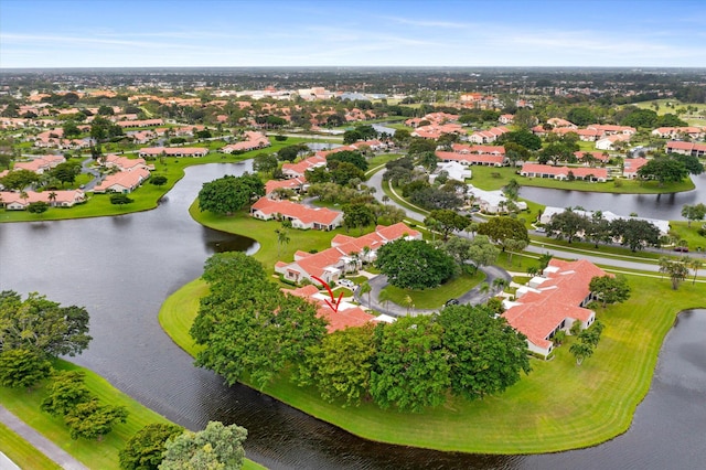 drone / aerial view with a water view