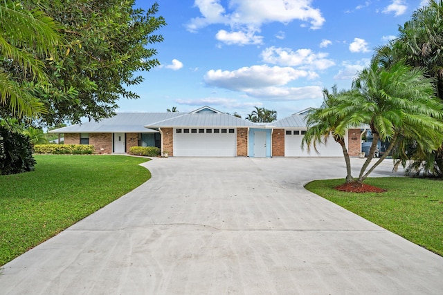 ranch-style house with a front yard and a garage