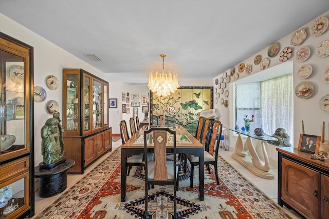 5609 SE Lamay Dr, Stuart, FL 34997 - dining space with a chandelier