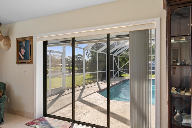 5609 SE Lamay Dr, Stuart, FL 34997 - entryway with a sunroom, light tile patterned floors, and baseboards