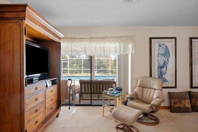 5609 SE Lamay Dr, Stuart, FL 34997 - sitting room featuring light carpet