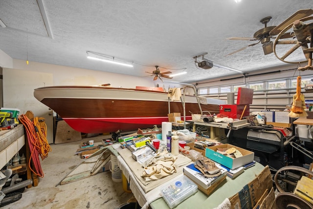 5609 SE Lamay Dr, Stuart, FL 34997 - garage with a ceiling fan and a garage door opener