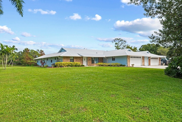 ranch-style home with a front lawn and a garage