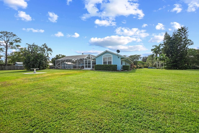 view of yard featuring a lanai