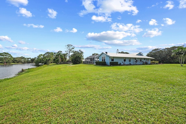 5609 SE Lamay Dr, Stuart, FL 34997 - view of green lawn with a water view