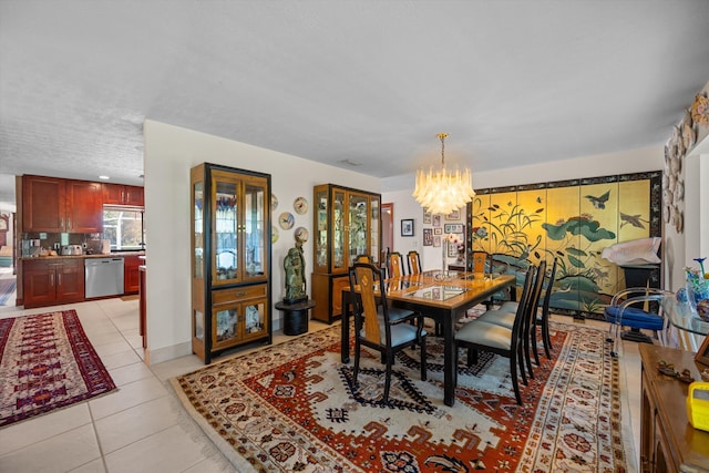 5609 SE Lamay Dr, Stuart, FL 34997 - dining space featuring a chandelier and light tile patterned floors