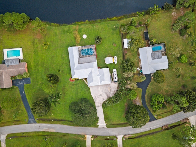 birds eye view of property featuring a water view