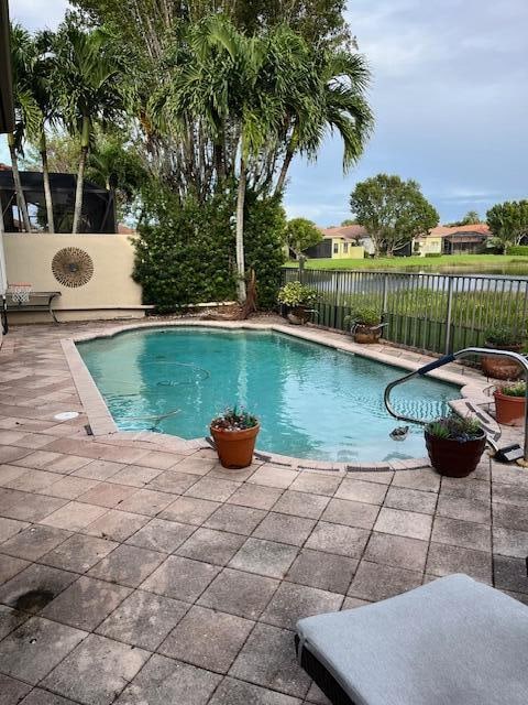 view of pool featuring a patio