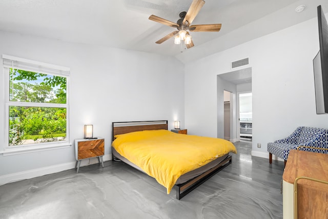 bedroom featuring lofted ceiling, multiple windows, and ceiling fan