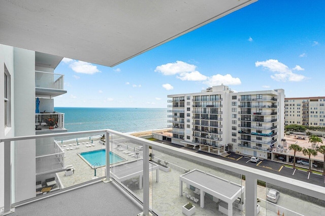 balcony featuring a water view