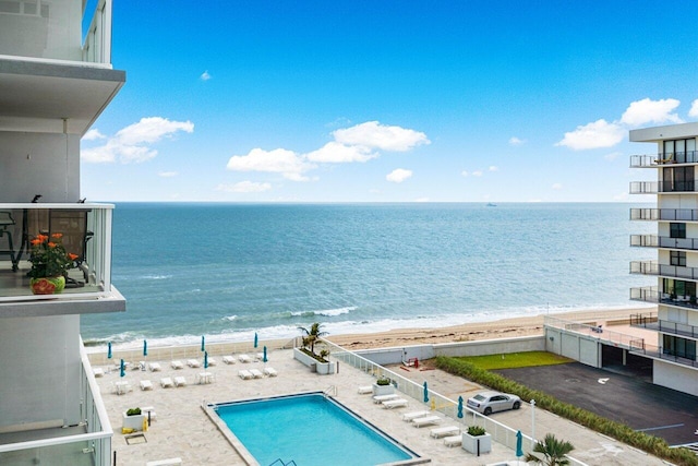 view of water feature with a beach view