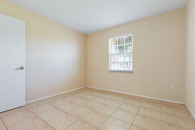 view of tiled spare room