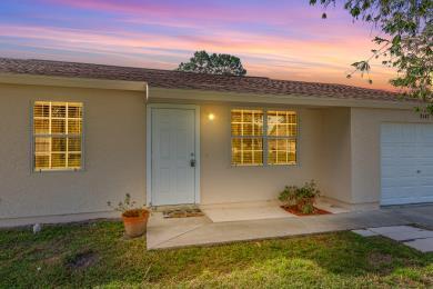 ranch-style home featuring a garage