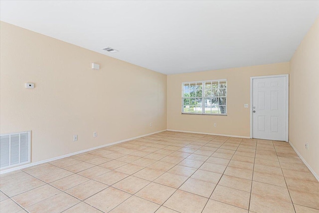 view of tiled spare room