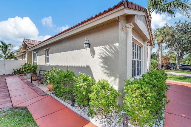 view of home's exterior with a patio area