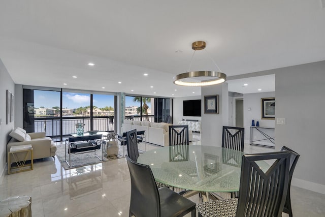 dining room featuring expansive windows