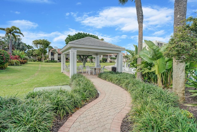 view of property's community featuring a gazebo and a lawn