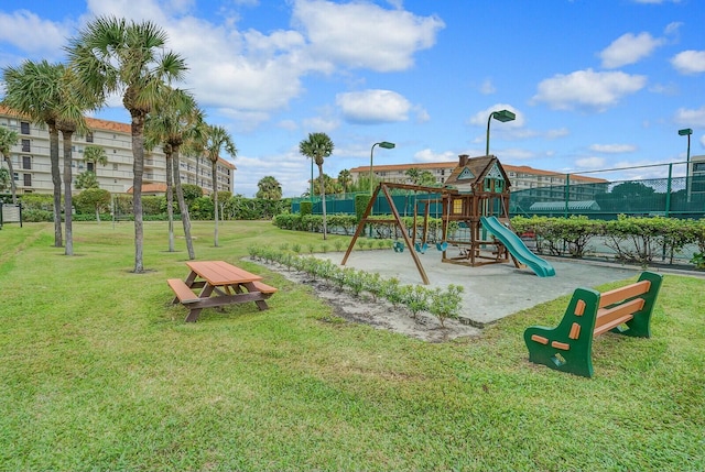 view of play area with a yard