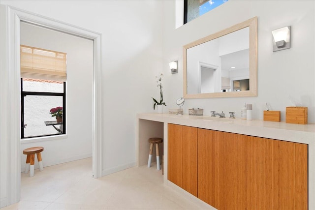 bathroom featuring vanity and a wealth of natural light