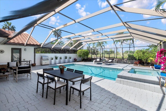 view of pool with glass enclosure, a grill, a patio area, and an outdoor hangout area