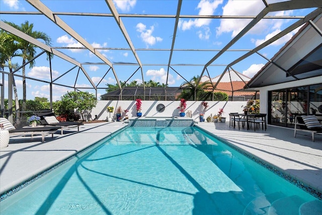 view of pool featuring a patio and a lanai