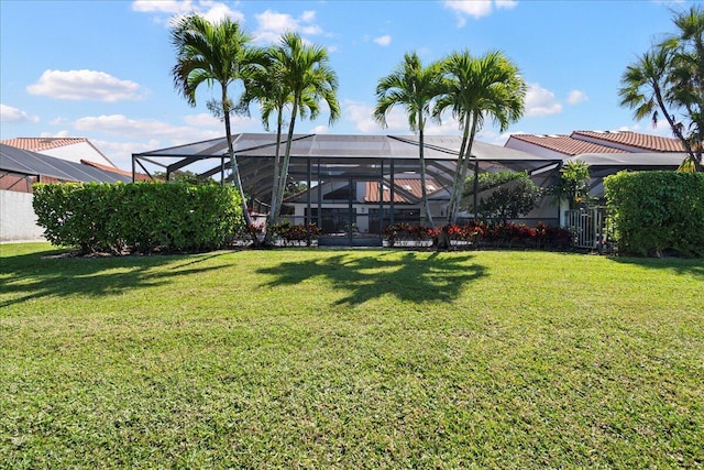 view of yard with a lanai