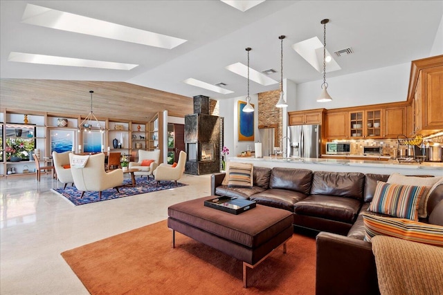 living room featuring a large fireplace and high vaulted ceiling