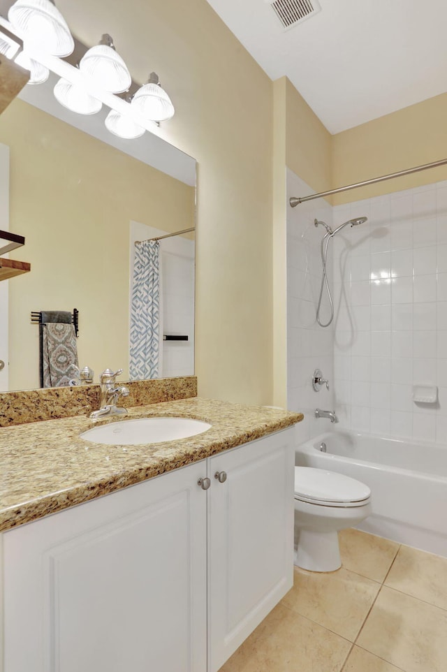 full bathroom featuring vanity, shower / tub combo with curtain, toilet, and tile patterned flooring