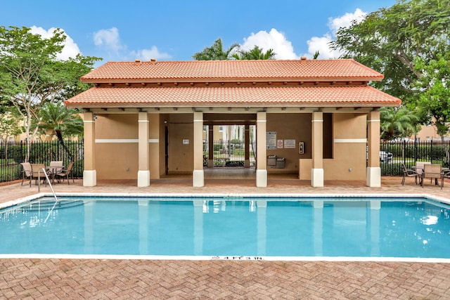 view of pool featuring a patio