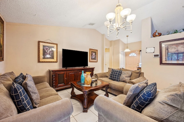 living room featuring light tile patterned floors, a notable chandelier, a textured ceiling, and lofted ceiling