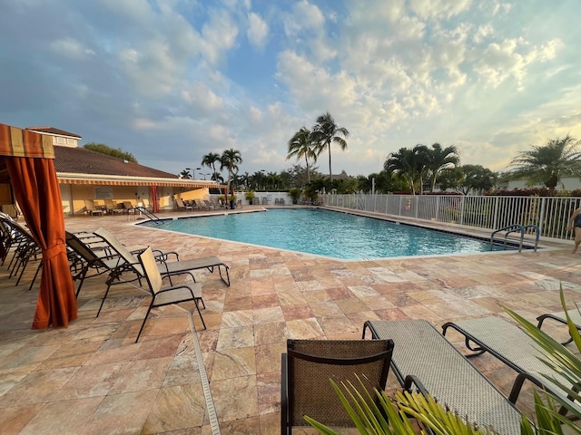 view of pool featuring a patio