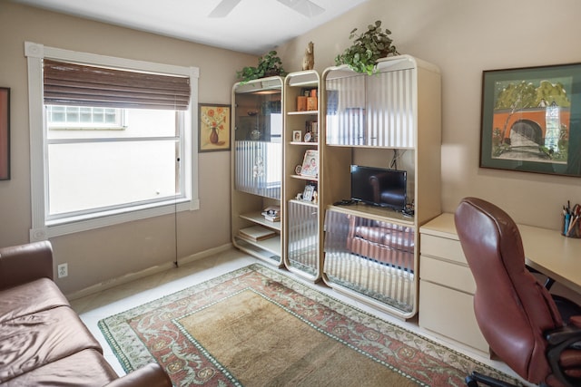 office area featuring tile patterned flooring and ceiling fan