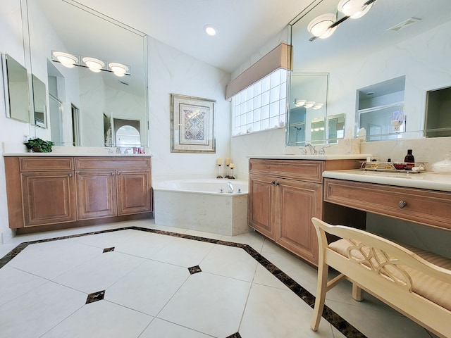 bathroom with vanity, independent shower and bath, and tile patterned floors