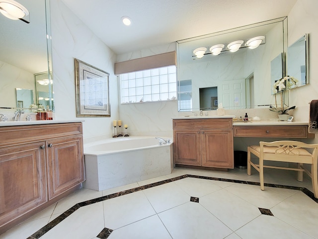 bathroom featuring vanity, a bath, and tile patterned flooring