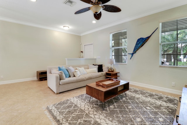 living room with ornamental molding, ceiling fan, and light tile patterned floors