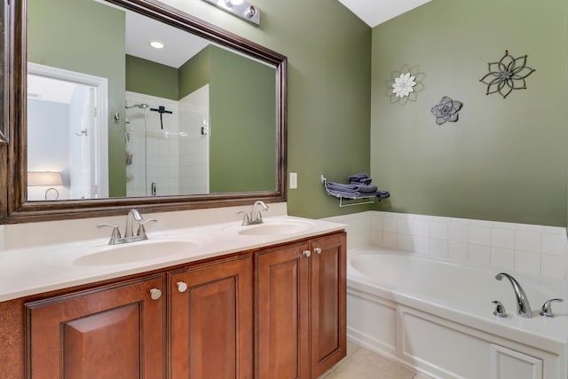 bathroom with vanity, tile patterned floors, and separate shower and tub