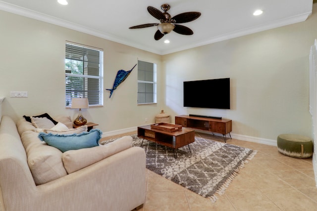 living room with ornamental molding, tile patterned flooring, and ceiling fan