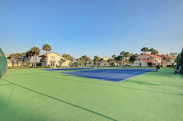 view of sport court featuring basketball hoop