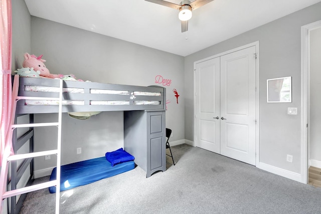 bedroom with ceiling fan and carpet flooring