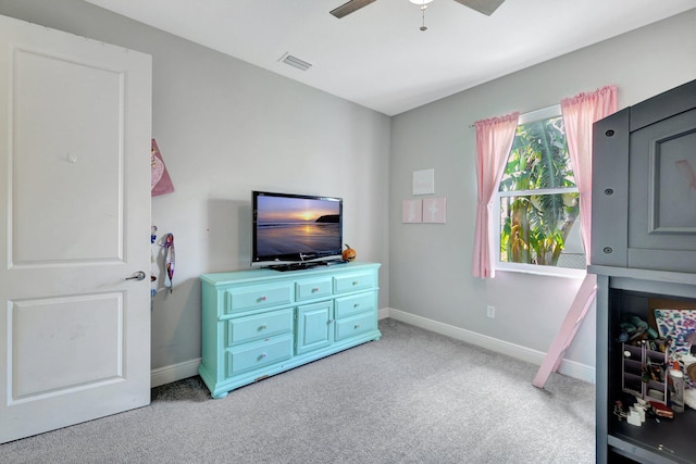 carpeted bedroom featuring ceiling fan