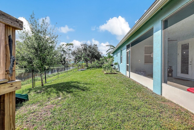 view of yard with a water view