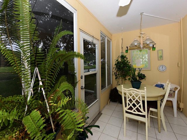 dining area with light tile patterned floors