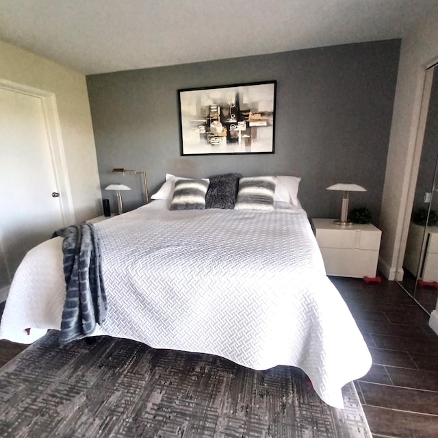 bedroom featuring baseboards