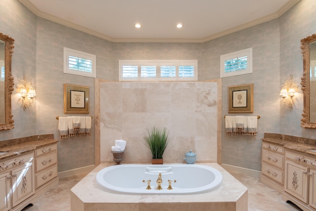 bathroom with tile walls, vanity, crown molding, and a relaxing tiled tub