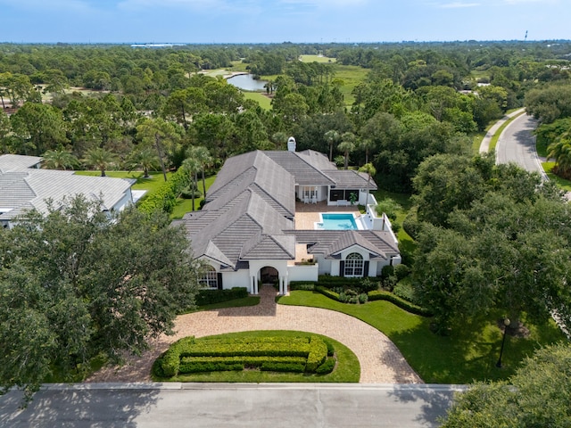 bird's eye view with a water view